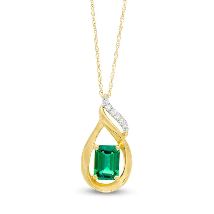 EmeraldCut LabCreated Emerald and Diamond Accent Flame Pendant in 10K Yellow Gold Goldia Necklaces EmeraldCut LabCreated Emerald and Diamond Accent Flame Pendant in 10K Yellow Gold Goldia Necklaces
