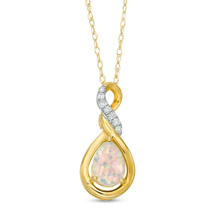 Goldia Necklaces PearShaped LabCreated Opal and Diamond Accent Cascading Teardrop Pendant in 10K Yellow Gold Goldia Necklaces PearShaped LabCreated Opal and Diamond Accent Cascading Teardrop Pendant in 10K Yellow Gold