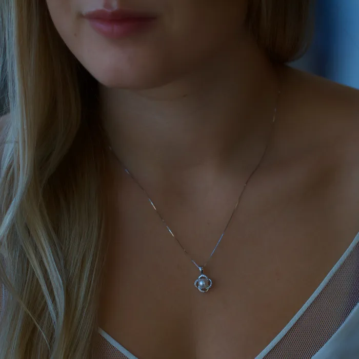 Independent Jewellers Necklaces 10kt White Gold Pearl and Diamond Flower Pendant Independent Jewellers Necklaces 10kt White Gold Pearl and Diamond Flower Pendant